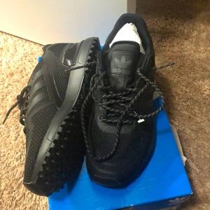 Size 4 1/2 youth all black adidas shoes